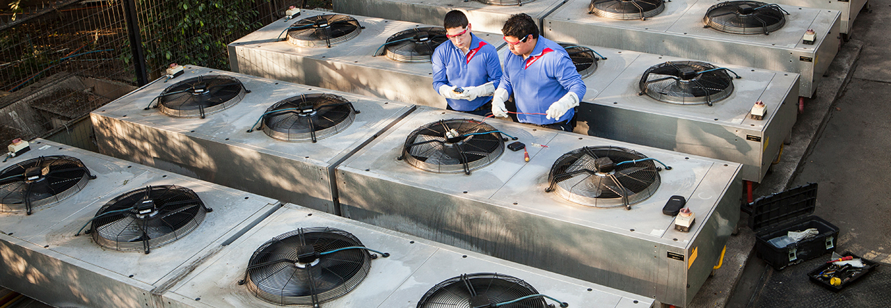 Two Sodexo colleagues are doing HVAC maintenance